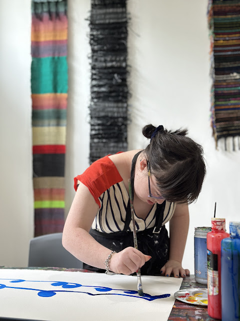 Artist-Matilda-painting-at-Studio-ARTES-Inner-West.-Image-courtesy-of-Studio-ARTES.jpg